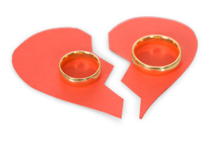 Broken Heart with wedding rings on top